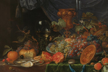 Still life painting with fruits, vegetables, and a candle on a table.